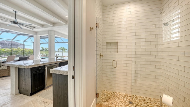 8537 Pavia Way, Bradenton, FL 34202 - bathroom featuring a stall shower, a ceiling fan, and beamed ceiling