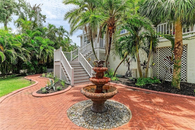 8963 Fishermens Bay Dr, Sarasota, FL 34231 - view of patio with stairway