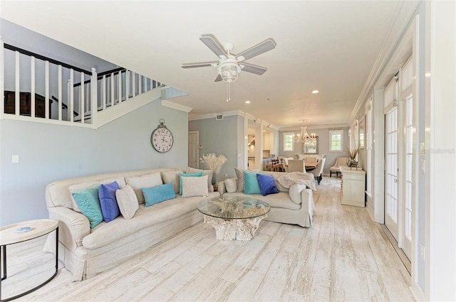8963 Fishermens Bay Dr, Sarasota, FL 34231 - living area featuring light wood-type flooring, a chandelier, crown molding, a ceiling fan, and recessed lighting