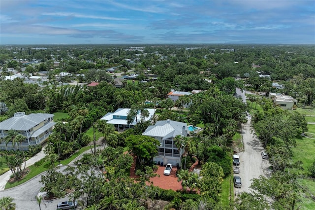 8963 Fishermens Bay Dr, Sarasota, FL 34231 - drone / aerial view of a tree filled landscape