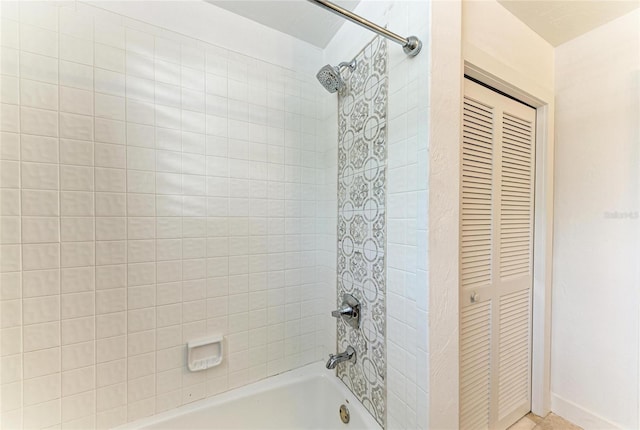 8963 Fishermens Bay Dr, Sarasota, FL 34231 - full bath featuring bathing tub / shower combination and a closet