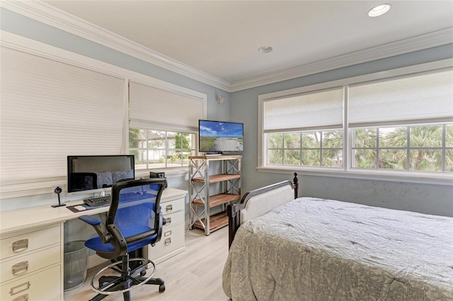 8963 Fishermens Bay Dr, Sarasota, FL 34231 - bedroom with light wood finished floors, an office area, ornamental molding, and recessed lighting