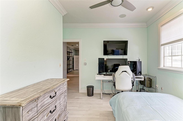 8963 Fishermens Bay Dr, Sarasota, FL 34231 - bedroom featuring light wood-style floors, crown molding, a ceiling fan, and an office area