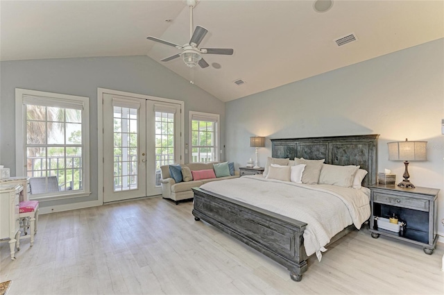 8963 Fishermens Bay Dr, Sarasota, FL 34231 - bedroom with light wood-style flooring, access to outside, vaulted ceiling, french doors, and a ceiling fan