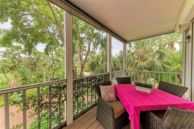 8963 Fishermens Bay Dr, Sarasota, FL 34231 - sunroom / solarium with outdoor dining space