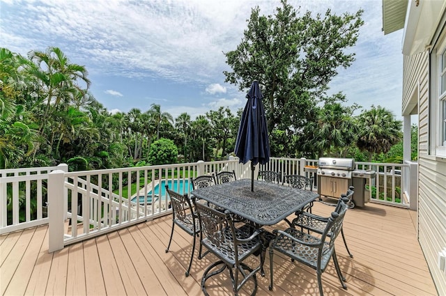 8963 Fishermens Bay Dr, Sarasota, FL 34231 - deck with area for grilling and outdoor dining space