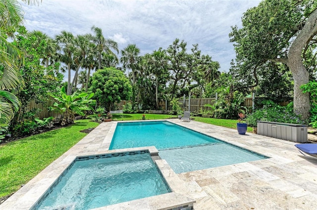 8963 Fishermens Bay Dr, Sarasota, FL 34231 - view of pool featuring a fenced backyard, a patio, and a pool with connected hot tub