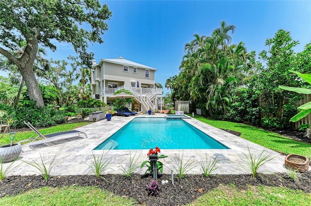 8963 Fishermens Bay Dr, Sarasota, FL 34231 - outdoor pool with stairs, a patio area, and a fenced backyard