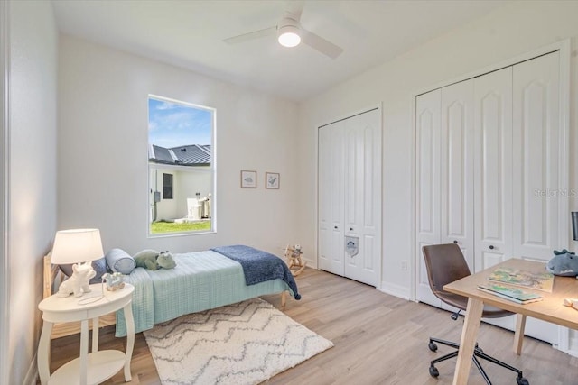 800 NW 36th Ave, Cape Coral, FL 33993 - bedroom featuring light wood-style floors, multiple closets, ceiling fan, and an office area