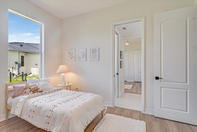 800 NW 36th Ave, Cape Coral, FL 33993 - bedroom with wood finished floors and baseboards