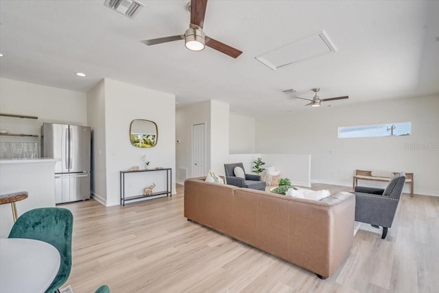 800 NW 36th Ave, Cape Coral, FL 33993 - living area featuring a ceiling fan, light wood-type flooring, baseboards, and recessed lighting