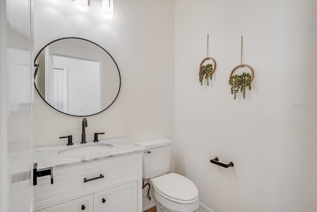 800 NW 36th Ave, Cape Coral, FL 33993 - half bath with vanity, toilet, and baseboards