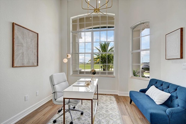 800 NW 36th Ave, Cape Coral, FL 33993 - office space with a chandelier, healthy amount of natural light, and wood finished floors