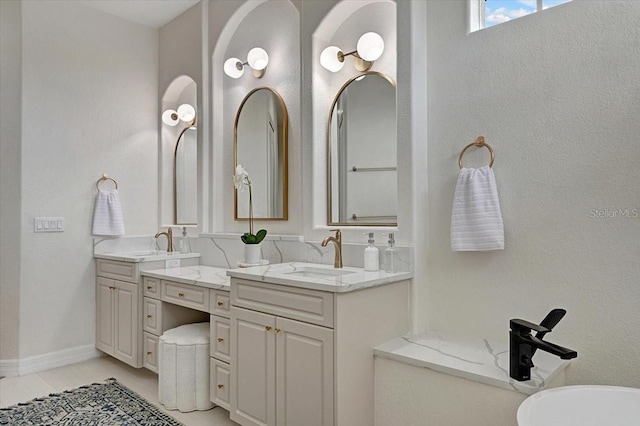 800 NW 36th Ave, Cape Coral, FL 33993 - full bathroom with double vanity and baseboards