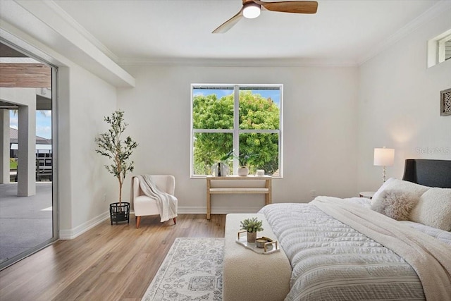 800 NW 36th Ave, Cape Coral, FL 33993 - bedroom with ornamental molding, light wood-type flooring, ceiling fan, and baseboards