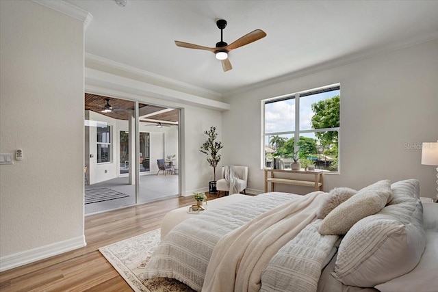 800 NW 36th Ave, Cape Coral, FL 33993 - bedroom featuring access to outside, light wood-style flooring, ornamental molding, baseboards, and ceiling fan