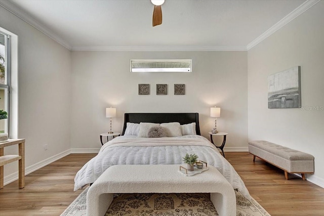 800 NW 36th Ave, Cape Coral, FL 33993 - bedroom featuring light wood finished floors, ornamental molding, baseboards, and a ceiling fan