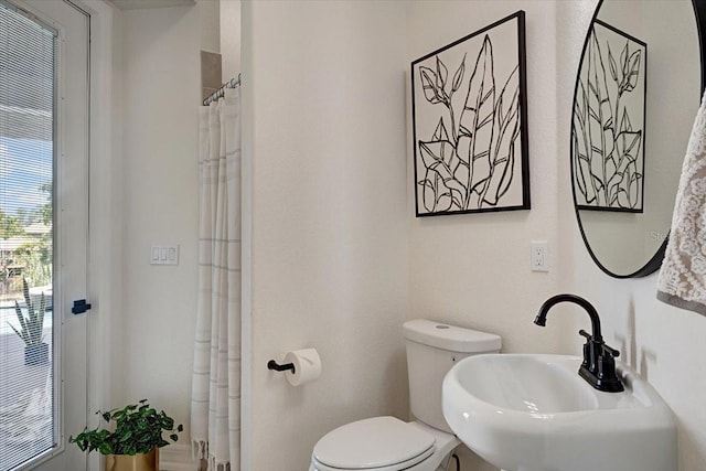 800 NW 36th Ave, Cape Coral, FL 33993 - full bath with toilet, a sink, and curtained shower