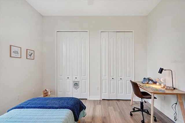 800 NW 36th Ave, Cape Coral, FL 33993 - bedroom featuring two closets, light wood-style floors, an office area, and baseboards