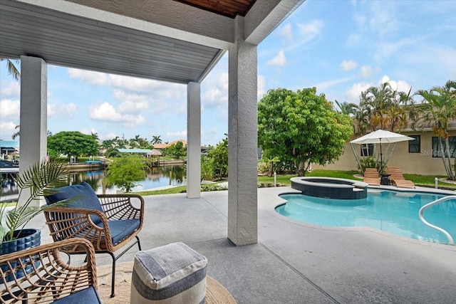 800 NW 36th Ave, Cape Coral, FL 33993 - view of swimming pool with a patio area, a water view, and a pool with connected hot tub