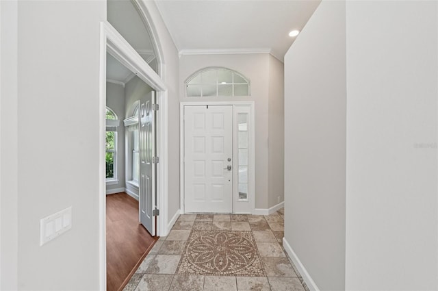 6744 Hickory Hammock Cir, Bradenton, FL 34202 - entrance foyer with ornamental molding, baseboards, stone tile floors, and recessed lighting