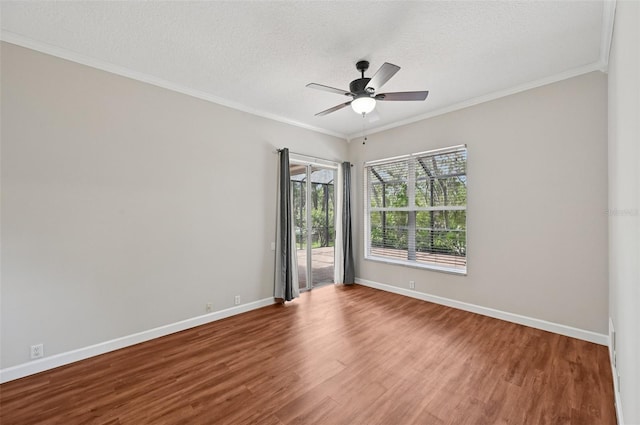 6744 Hickory Hammock Cir, Bradenton, FL 34202 - empty room with wood finished floors, baseboards, ornamental molding, a ceiling fan, and a textured ceiling