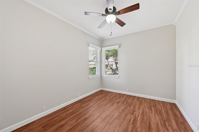6744 Hickory Hammock Cir, Bradenton, FL 34202 - empty room with ornamental molding, wood finished floors, baseboards, and ceiling fan