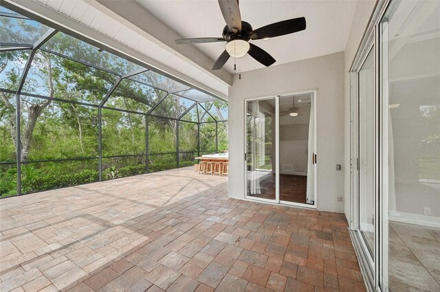 6744 Hickory Hammock Cir, Bradenton, FL 34202 - unfurnished sunroom featuring ceiling fan
