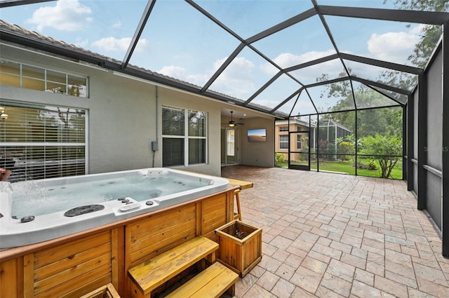 6744 Hickory Hammock Cir, Bradenton, FL 34202 - view of patio with a hot tub, a ceiling fan, and glass enclosure