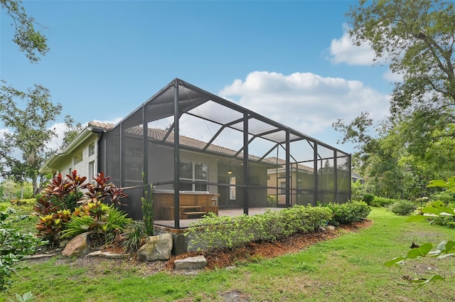 6744 Hickory Hammock Cir, Bradenton, FL 34202 - back of house with a patio, a lawn, and a lanai