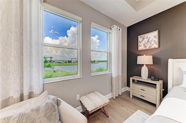 17898 Cherished Loop, Bradenton, FL 34211 - bedroom featuring light wood finished floors and baseboards