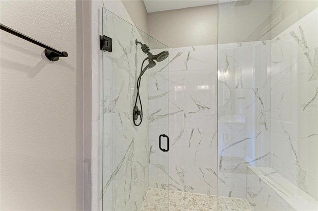 17898 Cherished Loop, Bradenton, FL 34211 - bathroom featuring a marble finish shower