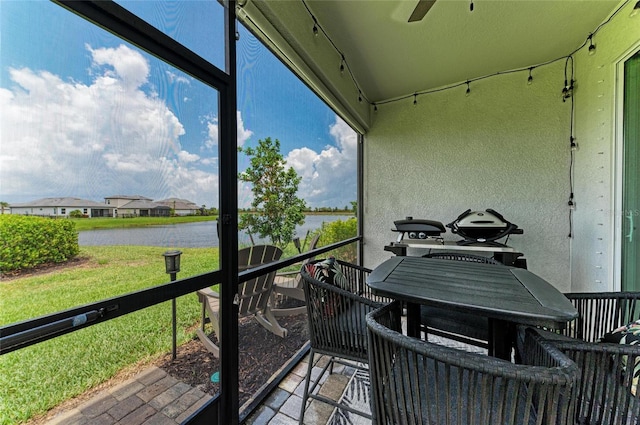 17898 Cherished Loop, Bradenton, FL 34211 - sunroom / solarium with a water view and a ceiling fan