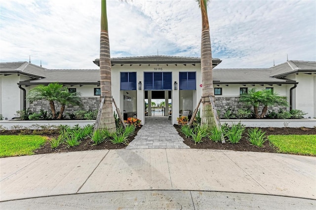 17898 Cherished Loop, Bradenton, FL 34211 - view of front facade with stucco siding and a tile roof