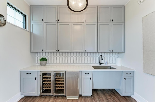 17898 Cherished Loop, Bradenton, FL 34211 - bar area featuring a sink, wine cooler, dark wood-style flooring, and decorative backsplash