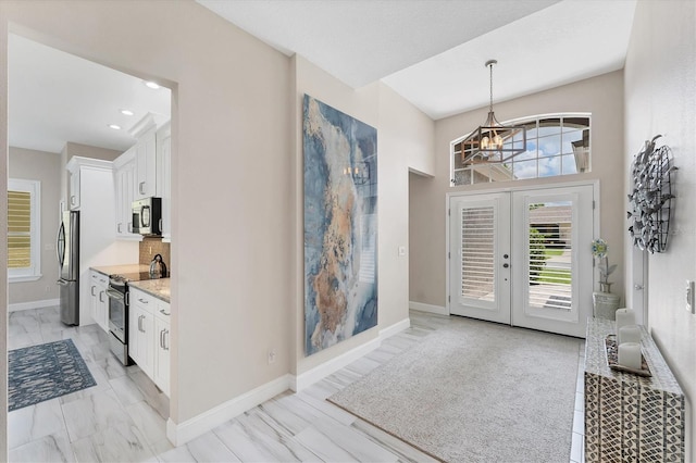 5142 51st Ln W, Bradenton, FL 34210 - foyer entrance with a chandelier and recessed lighting