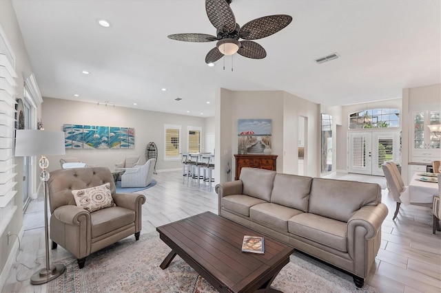 5142 51st Ln W, Bradenton, FL 34210 - living area with a ceiling fan, recessed lighting, and light wood finished floors