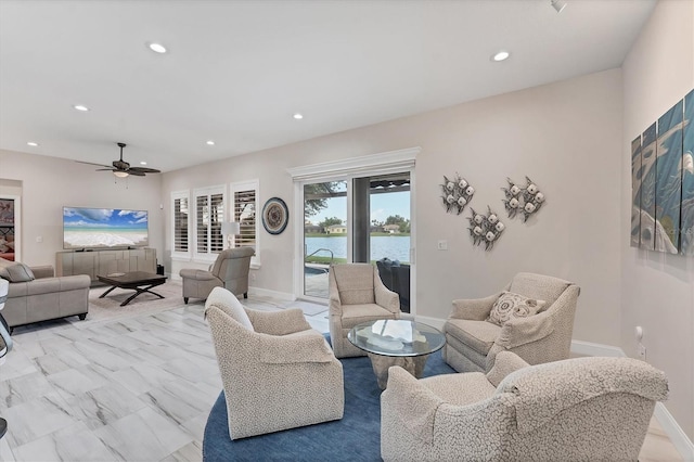 5142 51st Ln W, Bradenton, FL 34210 - living room featuring recessed lighting and ceiling fan