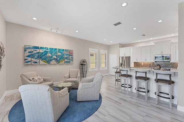 5142 51st Ln W, Bradenton, FL 34210 - living area with recessed lighting and baseboards