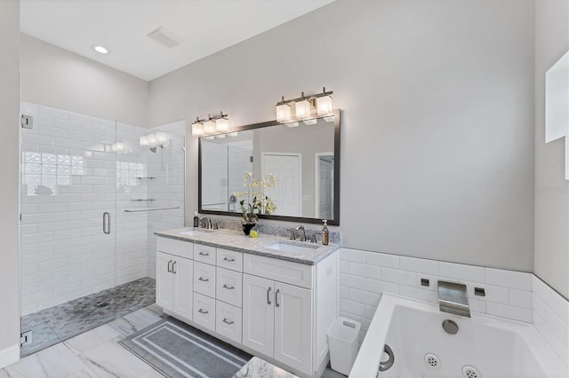 5142 51st Ln W, Bradenton, FL 34210 - bathroom with double vanity, a shower stall, a whirlpool tub, marble look tile flooring, and recessed lighting