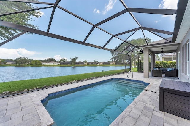 5142 51st Ln W, Bradenton, FL 34210 - outdoor pool featuring an outdoor hangout area, a patio, a water view, a yard, and glass enclosure