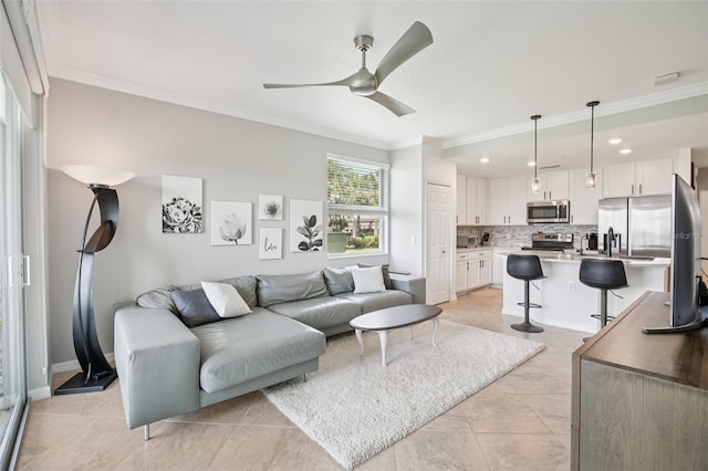 850 Tidewater Shores Loop Unit 108, Bradenton, FL 34208 - living room with crown molding, a ceiling fan, recessed lighting, and light tile patterned flooring