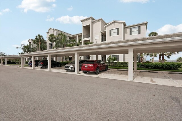 850 Tidewater Shores Loop Unit 108, Bradenton, FL 34208 - view of covered parking lot