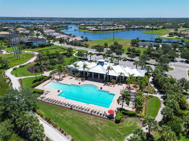 850 Tidewater Shores Loop Unit 108, Bradenton, FL 34208 - aerial perspective of suburban area with a nearby body of water and a pool