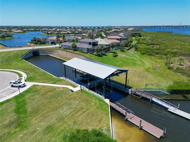 850 Tidewater Shores Loop Unit 108, Bradenton, FL 34208 - aerial perspective of suburban area featuring a nearby body of water