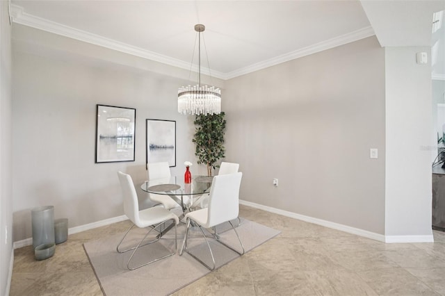 850 Tidewater Shores Loop Unit 108, Bradenton, FL 34208 - dining area with ornamental molding, baseboards, and a chandelier