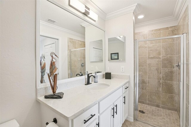 850 Tidewater Shores Loop Unit 108, Bradenton, FL 34208 - full bath featuring vanity, a stall shower, crown molding, and toilet