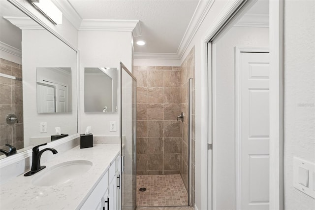 850 Tidewater Shores Loop Unit 108, Bradenton, FL 34208 - bathroom featuring a stall shower, vanity, and ornamental molding