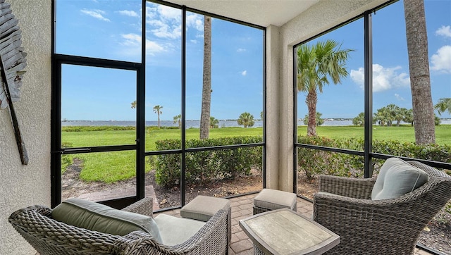 850 Tidewater Shores Loop Unit 108, Bradenton, FL 34208 - sunroom / solarium featuring healthy amount of natural light