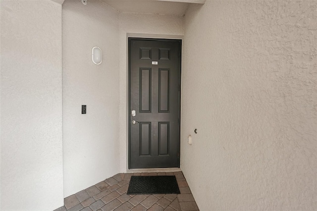 850 Tidewater Shores Loop Unit 108, Bradenton, FL 34208 - view of exterior entry with stucco siding